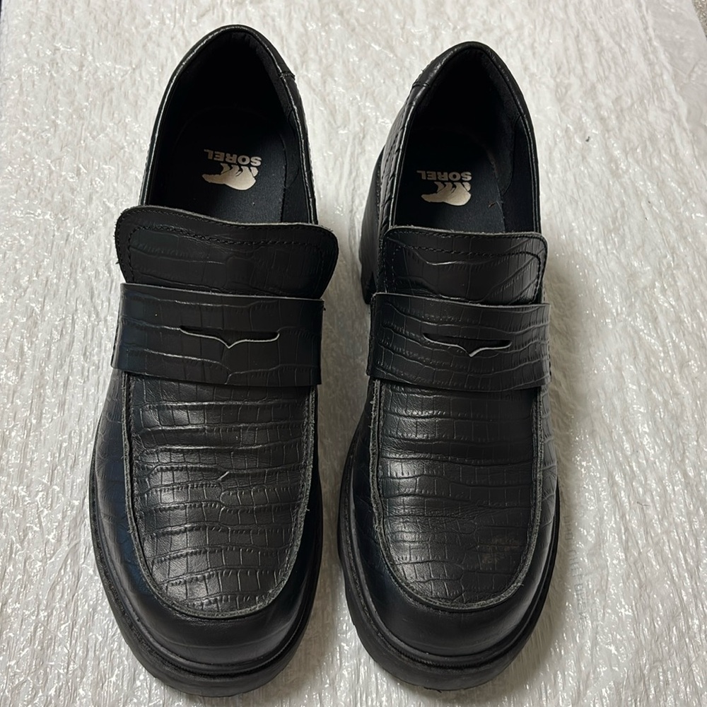 Sorel Black Slip-On Loafers with Platform Sole